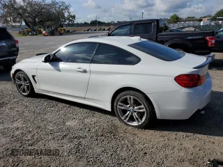 2014 BMW 4 Series 435i xDrive with VIN WBA3R5C59EK187836, listed as a Copart auction lot 63946075 with 100,700 mi miles and Salvage title. Bid and sale history available at DreamBid. Image 2.