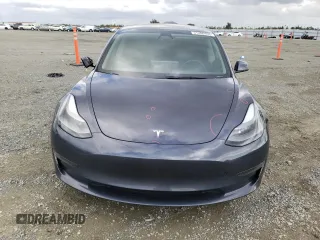 2023 Tesla Model 3 with VIN 5YJ3E1EA7PF395196, listed as a Copart auction lot 51260465 with 41,119 mi miles and Salvage title. Bid and sale history available at DreamBid. Image 5.