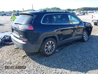 2019 Jeep Cherokee Latitude Plus with VIN 1C4PJMLBXKD229927, listed as a IAAI auction lot 42238552 with 90,984 mi miles and . Bid and sale history available at DreamBid. Image 4.