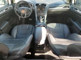2016 Ford Fusion Titanium with VIN 3FA6P0SU1GR316318, listed as a Copart auction lot 56244015 with 73,451 mi miles and Salvage title. Bid and sale history available at DreamBid. Image 8.