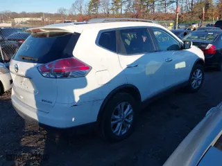 2016 Nissan Rogue SV with VIN KNMAT2MV2GP707020, listed as a IAAI auction lot 41574920 with 999,999 mi miles. Bid and sale history available at carsss.com. Image 4.