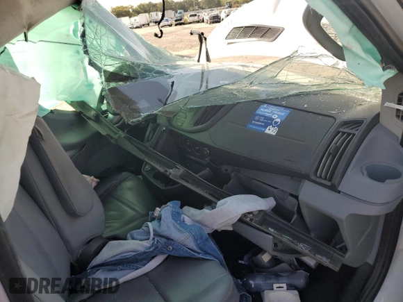 2018 Ford Transit z VIN 1FTYR1ZM3JKA37330, wystawiony jako Copart lot #72782594 z przebiegiem Nie podano mil oraz Szkoda całkowita • Salvage title. Historia ofert i sprzedaży dostępna na DreamBid. Obrazek 8.