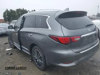 2016 Infiniti QX60 with VIN 5N1AL0MM1GC502111, listed as a IAAI auction lot 41866740 with 97,360 mi miles and . Bid and sale history available at DreamBid. Image 3.