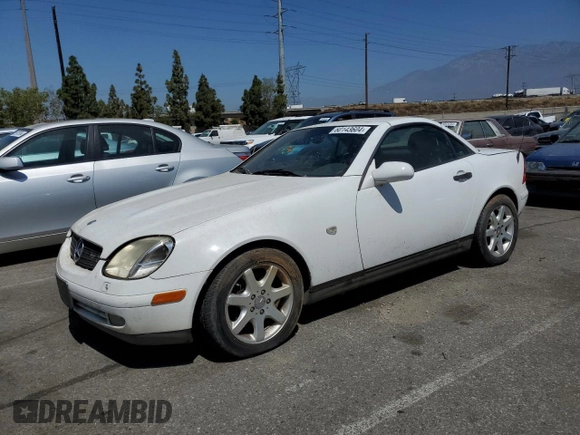 2000 Mercedes-Benz SLK-Class Kompressor with VIN WDBKK47F3YF152074, listed as a Copart auction lot 60143604 with 155,610 mi miles and Clean Title. Bid and sale history available at carsss.com. Image 1.
