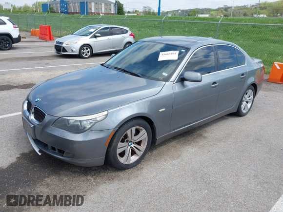 2010 BMW 5 Series 528i with VIN WBANU5C52AC129062, listed as a IAAI auction lot 42087362 with 200,403 mi miles and . Bid and sale history available at carsss.com. Image 2.