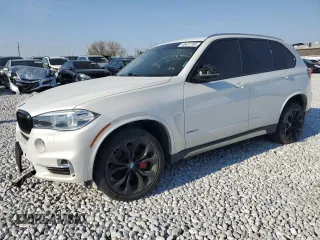 2014 BMW X5 xDrive50i z VIN 5UXKR6C50E0J73340, wystawiony jako Copart lot #46437785 z przebiegiem Nie podano mil oraz Szkoda całkowita • Salvage title. Historia ofert i sprzedaży dostępna na DreamBid. Obrazek 1.