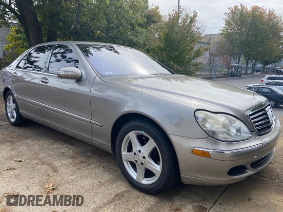2005 Mercedes-Benz S-Class 5.0L with VIN WDBNG75J35A460118, listed as a Copart auction lot 77103084 with 99,573 mi miles and Clean Title. Bid and sale history available at carsss.com. Image 1.