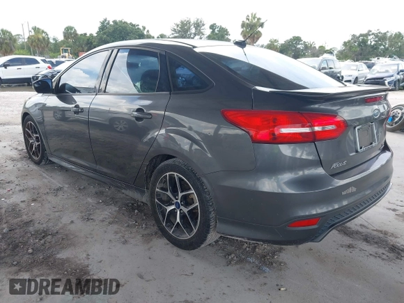 2015 Ford Focus SE with VIN 1FADP3F23FL247162, listed as a IAAI auction lot 42542583 with 95,852 mi miles and . Bid and sale history available at DreamBid. Image 3.