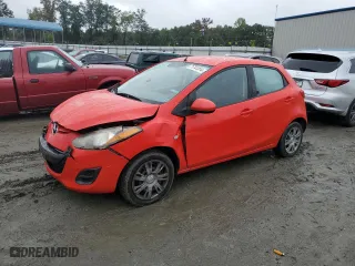 2012 Mazda Mazda2 Sport with VIN JM1DE1KY0C0142042, listed as a Copart auction lot 71741314 with 106,232 mi miles and Salvage Title. Bid and sale history available at carsss.com. Image 1.