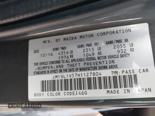 2017 Mazda 6 Touring with VIN JM1GL1V57H1127804, listed as a IAAI auction lot 41515342 with 107,336 mi miles and . Bid and sale history available at carsss.com. Image 9.