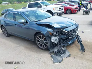 2016 Mazda 6 i Grand Touring with VIN JM1GJ1W53G1414530, listed as a IAAI auction lot 42353181 with 109,567 mi miles and . Bid and sale history available at DreamBid. Image 1.
