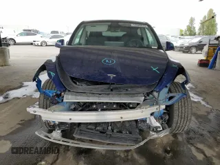 2024 Tesla Model Y с VIN 7SAYGDED2RF119770, выставлен на аукционе Copart как лот 53520875 с пробегом 6 712 миль миль и Списание • Salvage title. История ставок и продаж доступна на DreamBid. Изображение 5.
