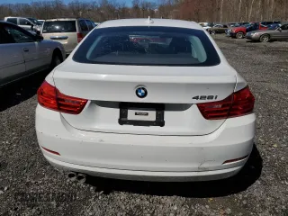 2015 BMW 4 Series 428i z VIN WBA4A9C53FGL85500, wystawiony jako Copart lot #50004575 z przebiegiem 129 018 mil mil oraz Szkoda całkowita • Salvage title. Historia ofert i sprzedaży dostępna na DreamBid. Obrazek 6.