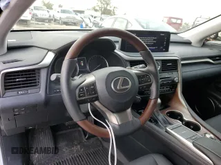 2022 Lexus RX with VIN JTJHZKEA5N2027824, listed as a Copart auction lot 71738562 with 5,100 mi miles. Bid and sale history available at carsss.com. Image 8.