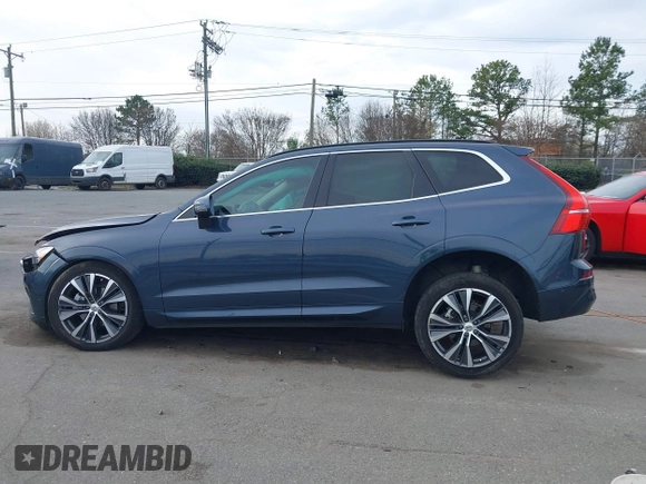 2022 Volvo XC60 Momentum z VIN YV4L12RK0N1059848, wystawiony jako IAAI lot #41714245 z przebiegiem 31 404 mil mil oraz . Historia ofert i sprzedaży dostępna na DreamBid. Obrazek 13.