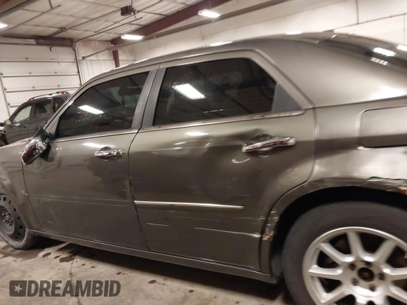 2010 Chrysler 300 Touring with VIN 2C3CA5CV9AH213299, listed as a IAAI auction lot 41754215 with 172,467 mi miles. Bid and sale history available at carsss.com. Image 15.