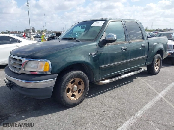 2001 Ford F-150 SuperCrew XLT with VIN 1FTRW07WX1KA43606, listed as a IAAI auction lot 41956736 with 278,543 mi miles. Bid and sale history available at carsss.com. Image 2.