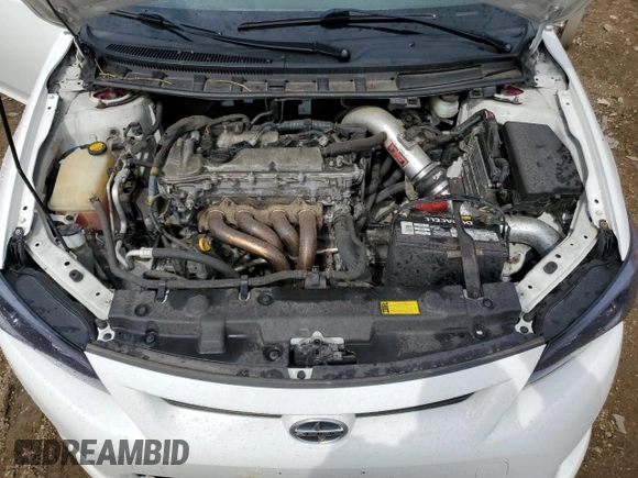 2012 Scion tC z VIN JTKJF5C71C3032427, wystawiony jako Copart lot #54160695 z przebiegiem 59 826 mil mil oraz Szkoda całkowita • Salvage title. Historia ofert i sprzedaży dostępna na DreamBid. Obrazek 11.