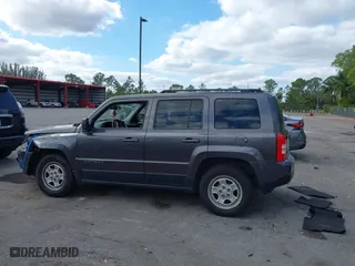 2015 Jeep Patriot Sport with VIN 1C4NJPBB5FD348985, listed as a IAAI auction lot 41035027 with 146,903 mi miles. Bid and sale history available at carsss.com. Image 14.
