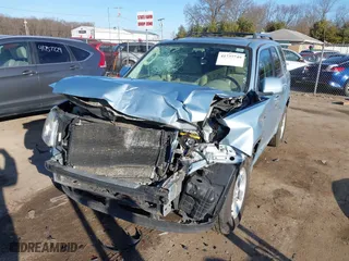 2009 Mercury Mariner Hybrid with VIN 4M2CU29359KJ04974, listed as a IAAI auction lot 41737749 with 150,783 mi miles. Bid and sale history available at carsss.com. Image 18.