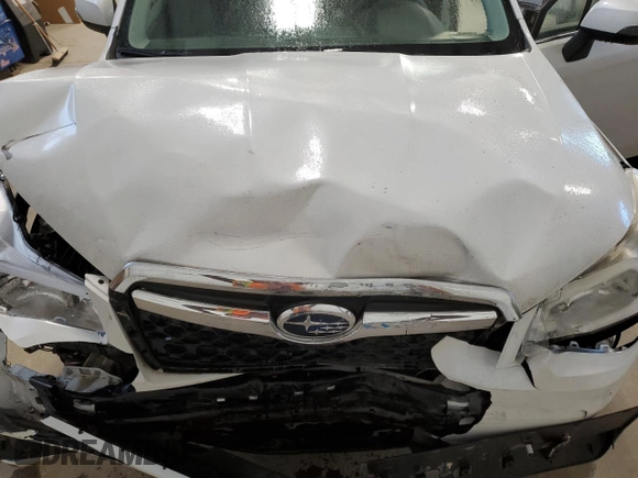 2014 Subaru Forester with VIN JF2SJCPC0EH482356, listed as a Copart auction lot 76072354 with 77,264 mi miles and Salvage title. Bid and sale history available at DreamBid. Image 12.