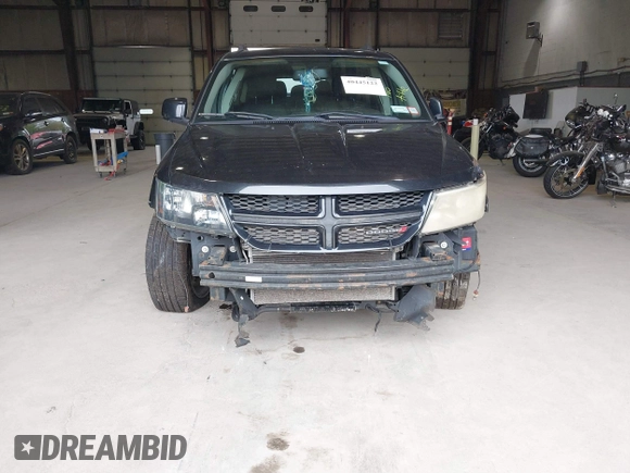 2013 Dodge Journey SXT with VIN 3C4PDDBG0DT660956, listed as a IAAI auction lot 41593385 with 196,021 mi miles and . Bid and sale history available at DreamBid. Image 6.