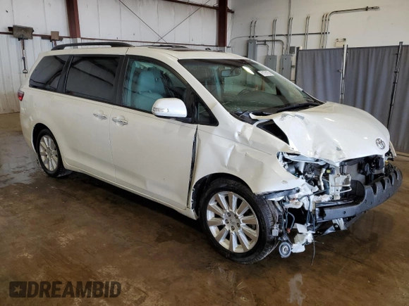 2015 Toyota Sienna XLE with VIN 5TDYK3DC4FS688299, listed as a Copart auction lot 61793155 with 57,197 mi miles and Salvage title. Bid and sale history available at DreamBid. Image 4.