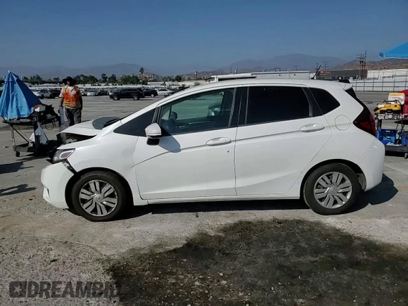 2015 Honda Fit LX with VIN 3HGGK5G55FM747740, listed as a Copart auction lot 61692725 with 61,923 mi miles and Salvage title. Bid and sale history available at DreamBid. Image 13.