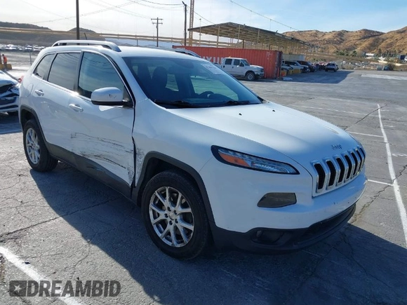 2016 Jeep Cherokee Latitude with VIN 1C4PJLCB9GW149217, listed as a IAAI auction lot 41365164 with 144,702 mi miles. Bid and sale history available at carsss.com. Image 1.