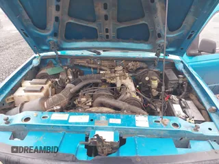 1995 Mazda B-Series Truck z VIN 4F4CR12A4STM06113, wystawiony jako IAAI lot #41674480 z przebiegiem 290 348 mil mil oraz . Historia ofert i sprzedaży dostępna na DreamBid. Obrazek 10.