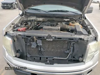 2012 Ford F-150 XL z VIN 1FTEW1CM6CFA21283, wystawiony jako Copart lot #58930895 z przebiegiem 273 283 mil mil oraz Szkoda całkowita • Salvage title. Historia ofert i sprzedaży dostępna na DreamBid. Obrazek 11.