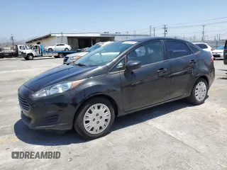 2014 Ford Fiesta S with VIN 3FADP4AJXEM128218, listed as a Copart auction lot 58033785 with 104,984 mi miles and Salvage title. Bid and sale history available at DreamBid. Image 1.
