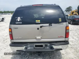 2003 GMC Yukon SLT z VIN 1GKEC13Z53J281504, wystawiony jako Copart lot #57526355 z przebiegiem 268 306 mil mil oraz Szkoda całkowita • Salvage title. Historia ofert i sprzedaży dostępna na DreamBid. Obrazek 6.