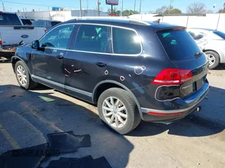 2016 Volkswagen Touareg Sport with VIN WVGEF9BP4GD012265, listed as a IAAI auction lot 41208383 with 69,205 mi miles and . Bid and sale history available at DreamBid. Image 3.