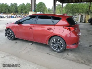 2018 Toyota Corolla iM with VIN JTNKARJE0JJ560578, listed as a Copart auction lot 71269674 with 106,667 mi miles and Salvage Title. Bid and sale history available at carsss.com. Image 2.
