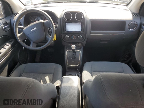2010 Jeep Compass Sport with VIN 1J4NF4FB2AD591523, listed as a Copart auction lot 48809775 with 105,720 mi miles and Salvage Title. Bid and sale history available at carsss.com. Image 8.