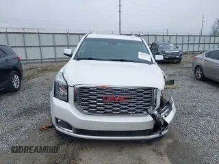 2019 GMC Yukon Denali with VIN 1GKS1CKJ7KR364240, listed as a IAAI auction lot 41645374 with 104,956 mi miles. Bid and sale history available at carsss.com. Image 12.