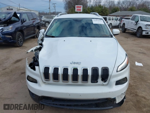 2015 Jeep Cherokee Latitude z VIN 1C4PJMCS9FW625521, wystawiony jako IAAI lot #41894602 z przebiegiem 112 865 mil mil oraz . Historia ofert i sprzedaży dostępna na DreamBid. Obrazek 12.