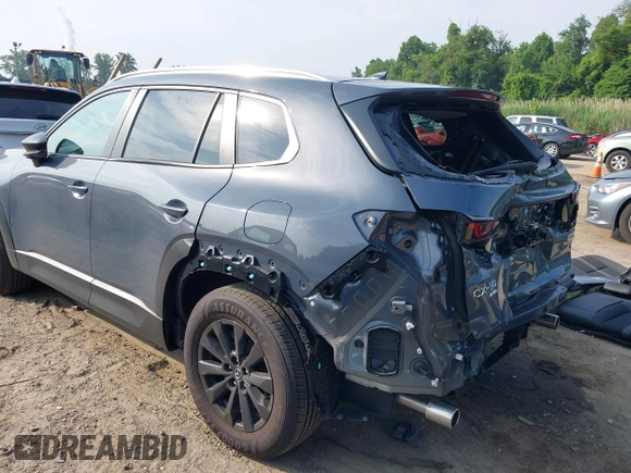 2024 Mazda CX-50 S Premium z VIN 7MMVABDM7RN231991, wystawiony jako IAAI lot #42481427 z przebiegiem 7 843 mil mil oraz . Historia ofert i sprzedaży dostępna na DreamBid. Obrazek 21.