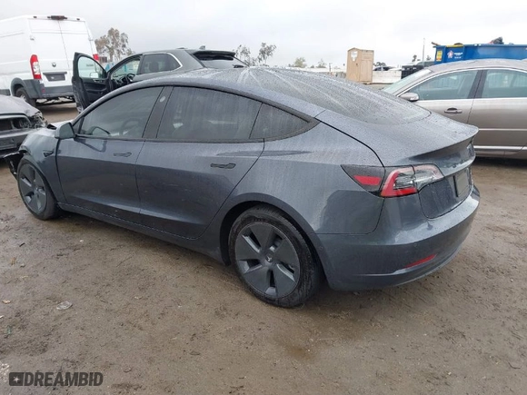 2022 Tesla Model 3 Long Range with VIN 5YJ3E1EBXNF138538, listed as a IAAI auction lot 41771647 with 31,250 mi miles. Bid and sale history available at carsss.com. Image 3.
