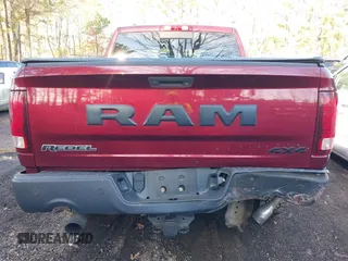 2017 Ram 1500 Rebel with VIN 1C6RR7YT6HS760106, listed as a IAAI auction lot 41671874 with 102,101 mi miles and . Bid and sale history available at DreamBid. Image 16.