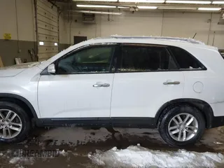 2015 Kia Sorento LX with VIN 5XYKT4A79FG585120, listed as a IAAI auction lot 41533779 with 127,337 mi miles. Bid and sale history available at carsss.com. Image 14.