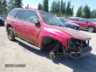 2002 GMC Envoy SLT z VIN 1GKDT13S022518682, wystawiony jako IAAI lot #42441658 z przebiegiem Nie podano mil oraz . Historia ofert i sprzedaży dostępna na DreamBid. Obrazek 1.