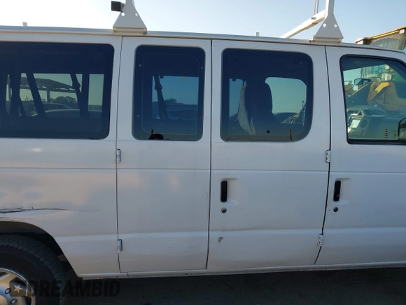 2011 Ford Econoline Passenger XL with VIN 1FBNE3BL0BDA75121, listed as a IAAI auction lot 41469640 with 105,558 mi miles. Bid and sale history available at carsss.com. Image 13.