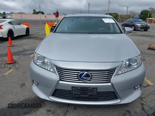2015 Lexus ES 300h with VIN JTHBW1GG1F2084938, listed as a IAAI auction lot 41761844 with 69,854 mi miles and . Bid and sale history available at DreamBid. Image 12.