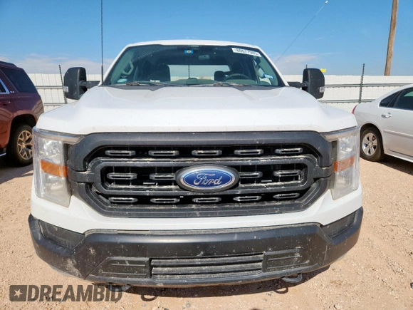 2022 Ford F-150 XL with VIN 1FTFW1E57NKE15119, listed as a Copart auction lot 60677985 with 79,006 mi miles and Salvage title. Bid and sale history available at DreamBid. Image 5.