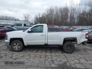 2015 Chevrolet Silverado 1500 LT with VIN 1GCNKRECXFZ414527, listed as a IAAI auction lot 41024683 with 219,673 mi miles. Bid and sale history available at carsss.com. Image 14.