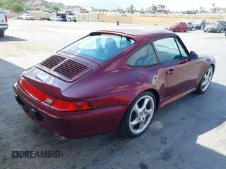 1997 Porsche 911 with VIN WP0AA2998VS322699, listed as a IAAI auction lot 41892833 with 117,174 mi miles and . Bid and sale history available at DreamBid. Image 4.