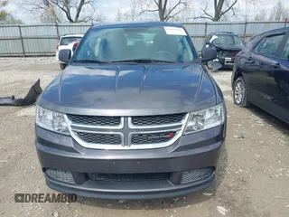 2014 Dodge Journey SE with VIN 3C4PDCAB1ET219760, listed as a IAAI auction lot 42013441 with 106,212 mi miles and . Bid and sale history available at carsss.com. Image 13.