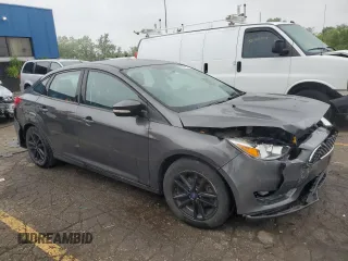 2016 Ford Focus SE with VIN 1FADP3F24GL312246, listed as a Copart auction lot 58564955 with 146,598 mi miles and Clean title. Bid and sale history available at DreamBid. Image 4.
